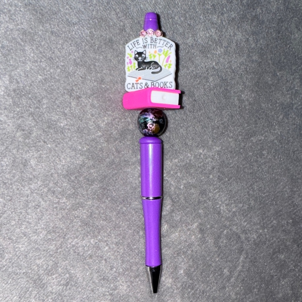 Purple Pen with Cat and Book Design